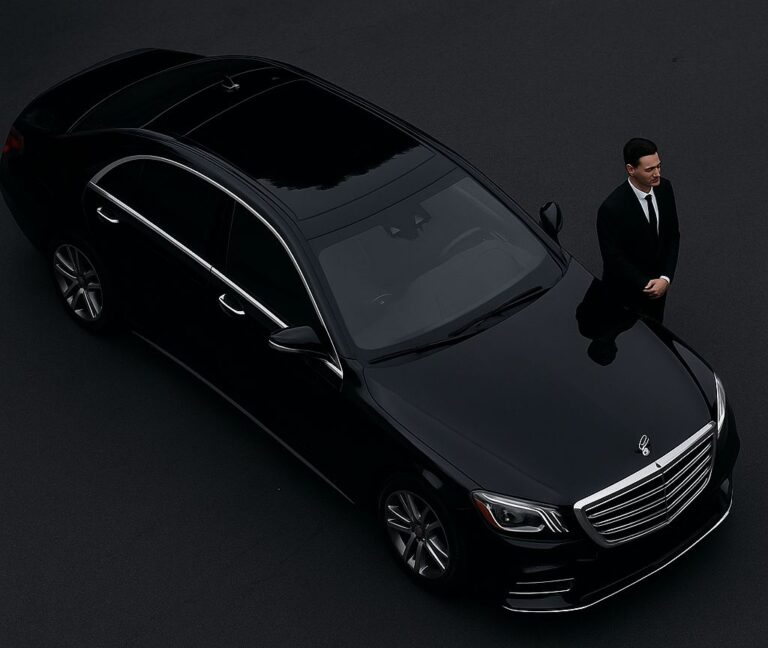 Chauffeur with luxury black car – Richline’s Encinitas Transportation Services